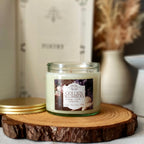 Golden Slumbers candle in clear glass jar
